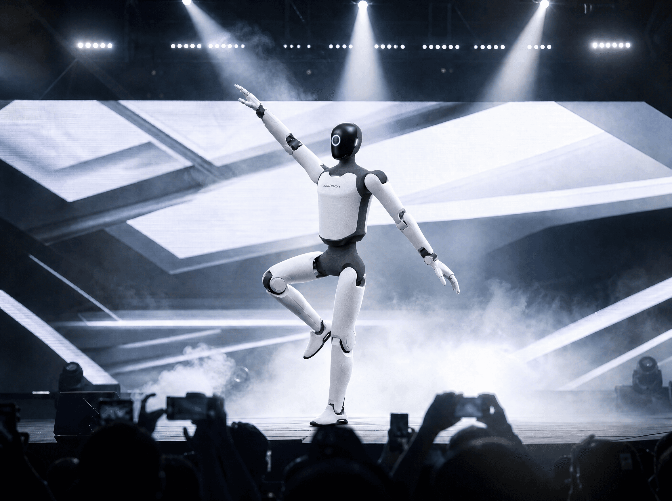A bipedal service robot dynamically performing under spotlights on an entertainment stage.